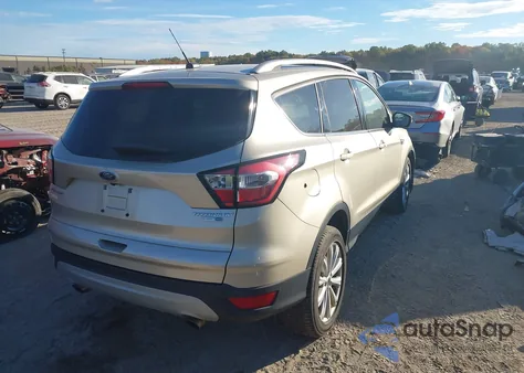 2017 Ford Escape Titanium из США, поврежденный, VIN 1FMCU9J9XHUB58283